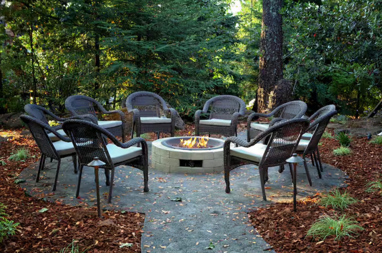 Fire pit surrounded by chairs